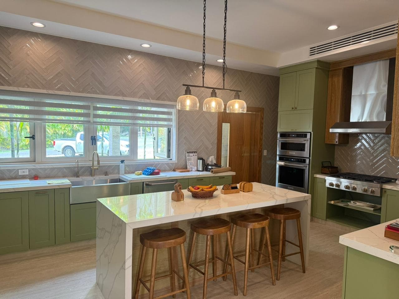 Custom wood kitchen cabinetry with integrated appliances